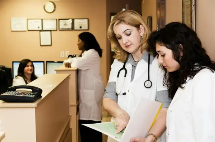 woman in white long sleeve shirt. HealthCare